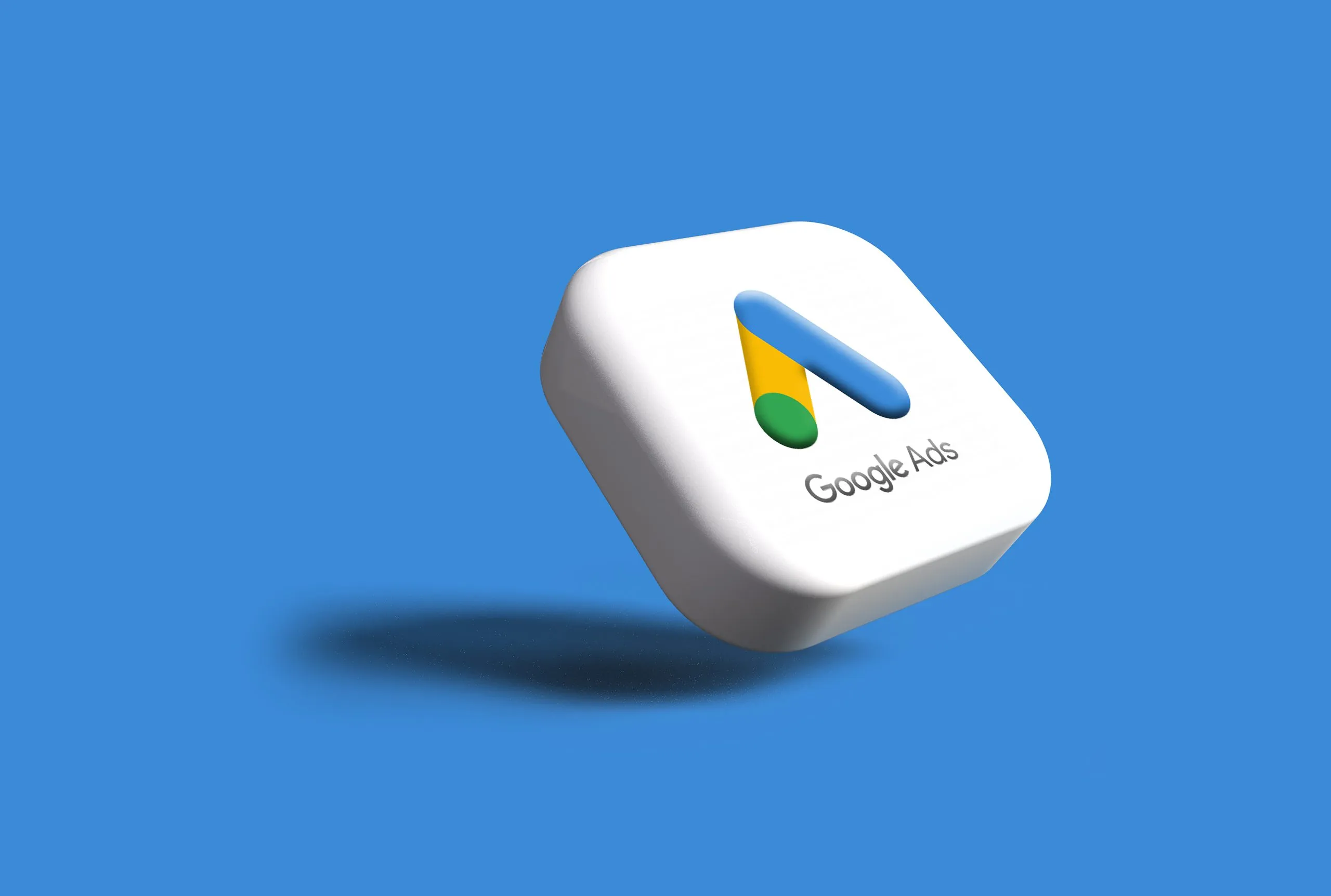 White tile with 'Google Ads' inscribed.